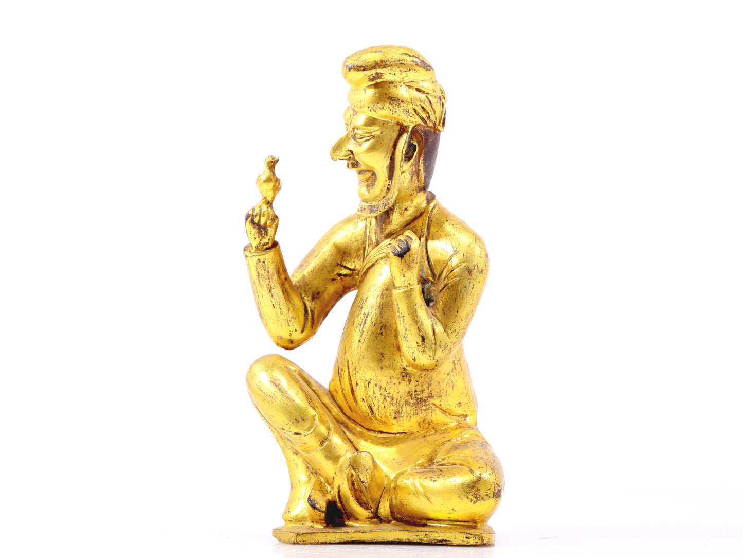 A serene gilt bronze figure