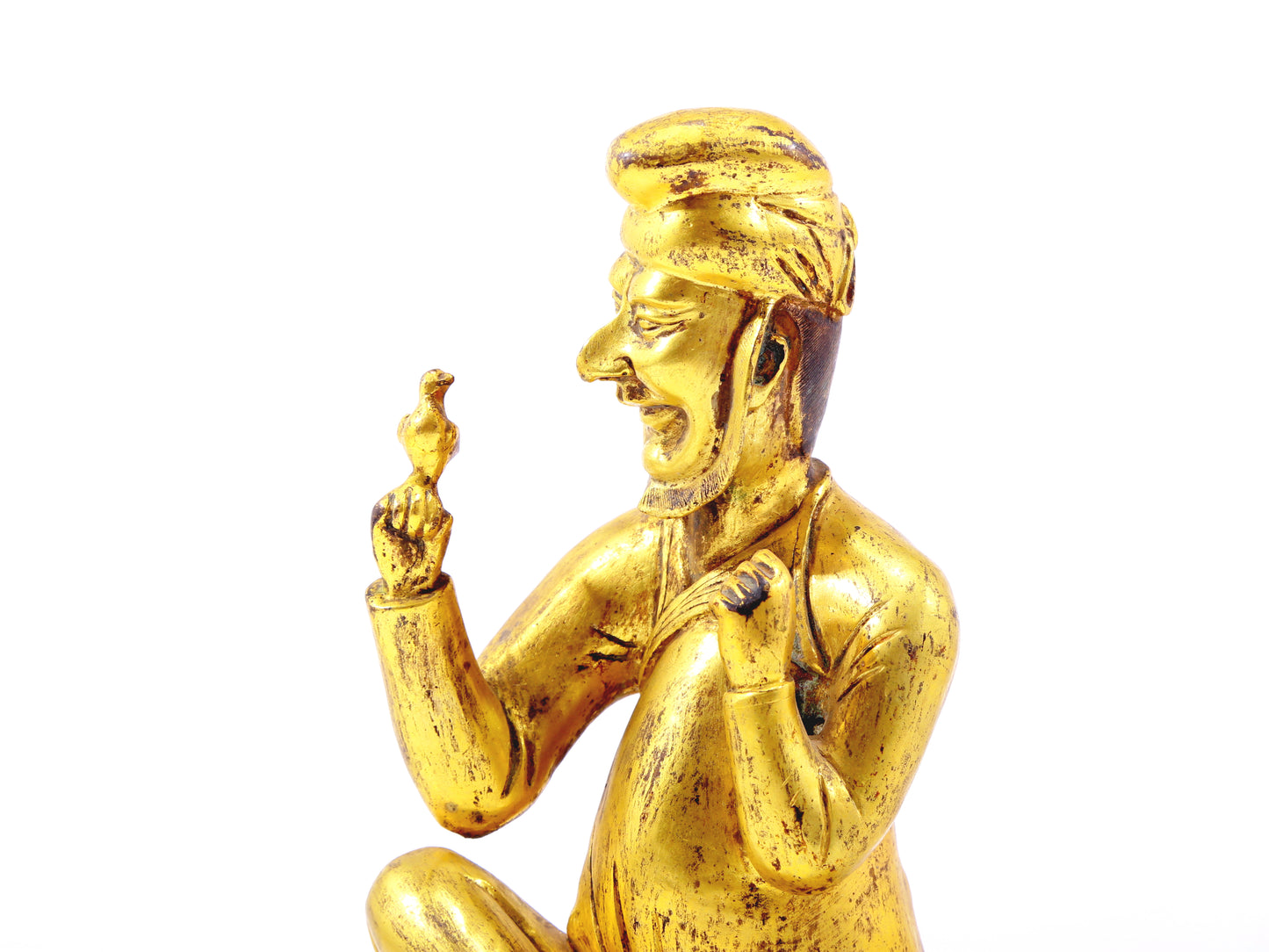 A serene gilt bronze figure