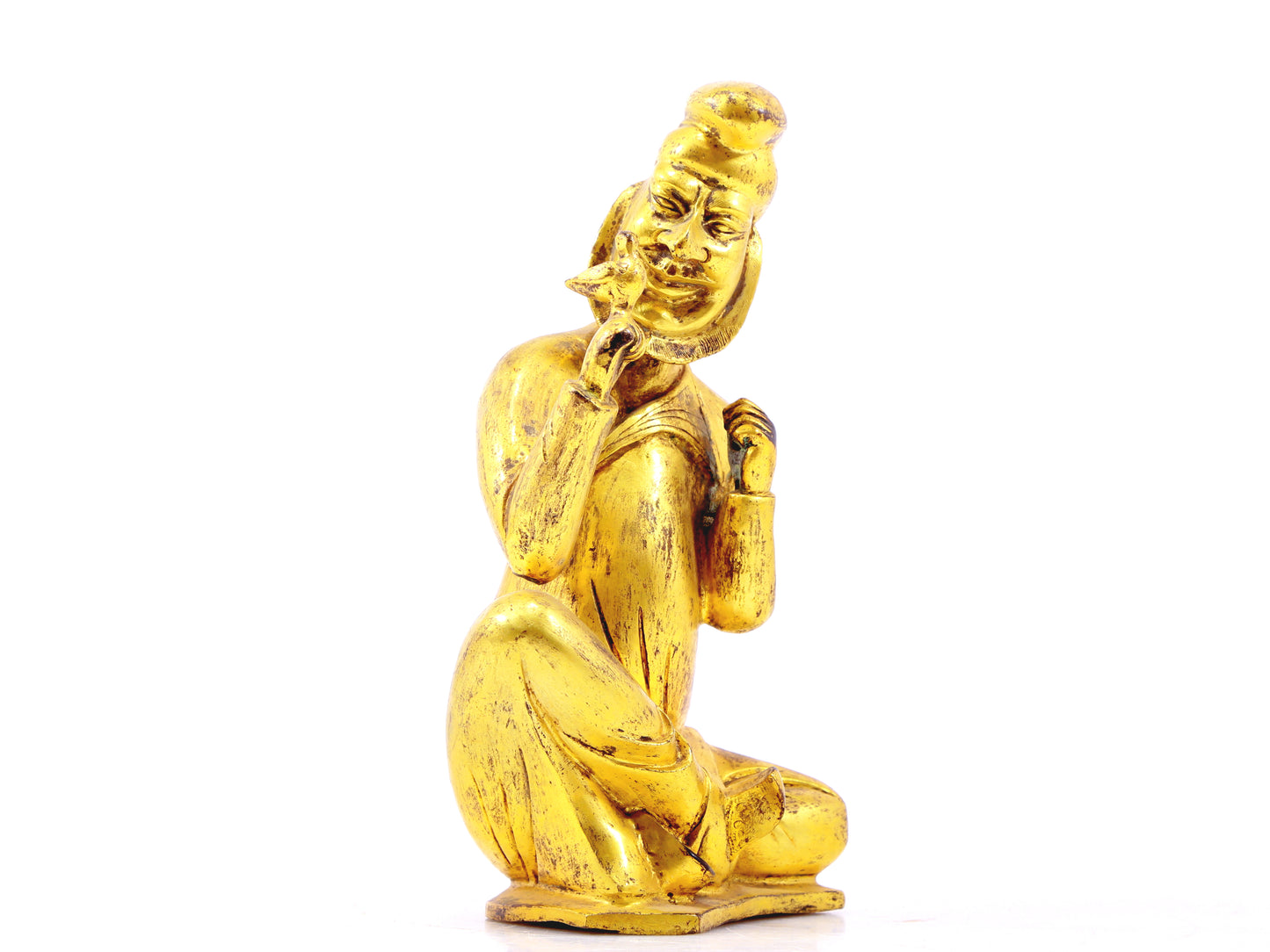 A serene gilt bronze figure