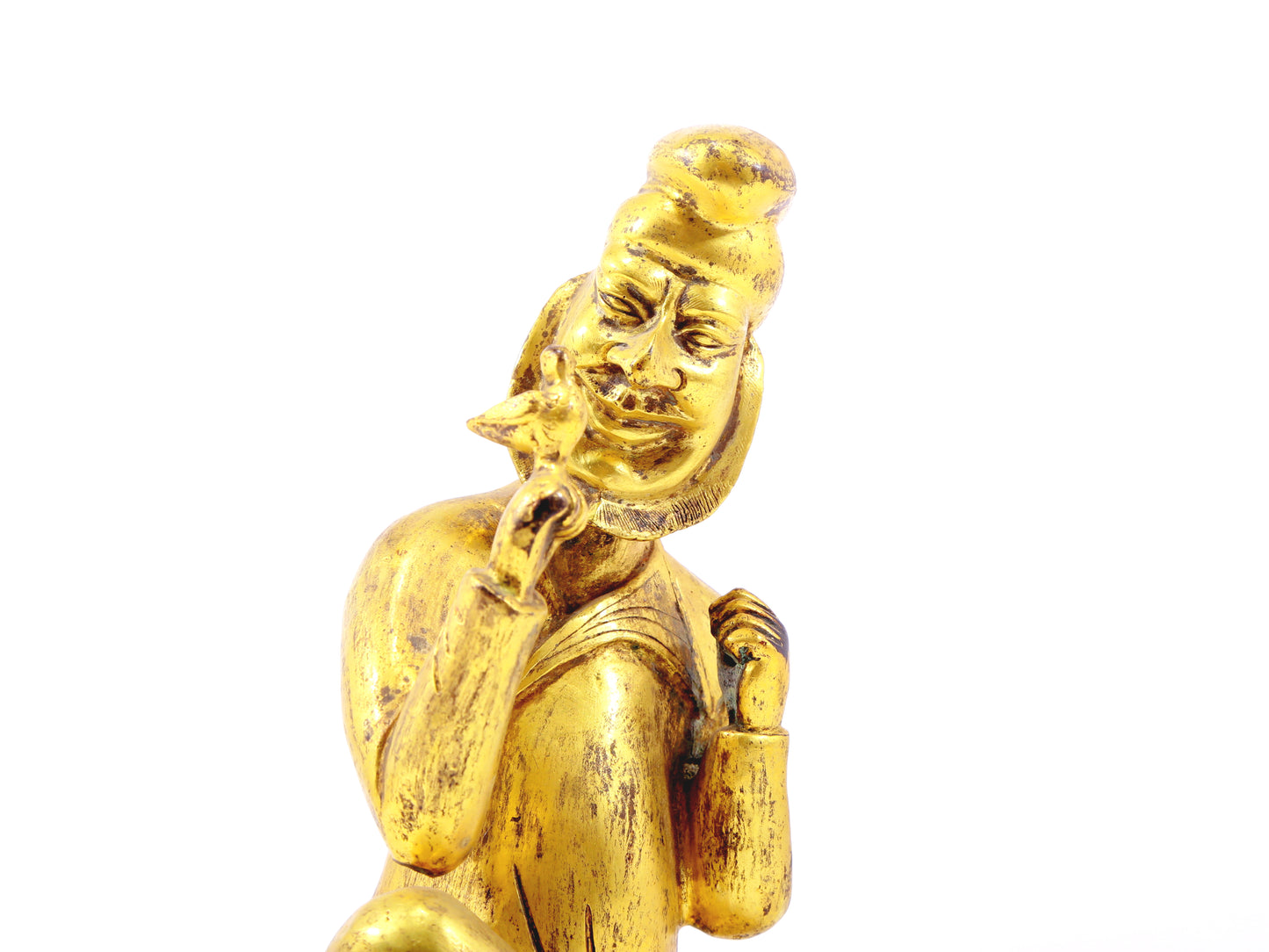 A serene gilt bronze figure