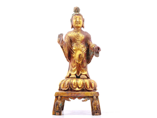 A serene gilt-bronze Tathagata statue