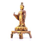 A serene gilt-bronze Tathagata statue