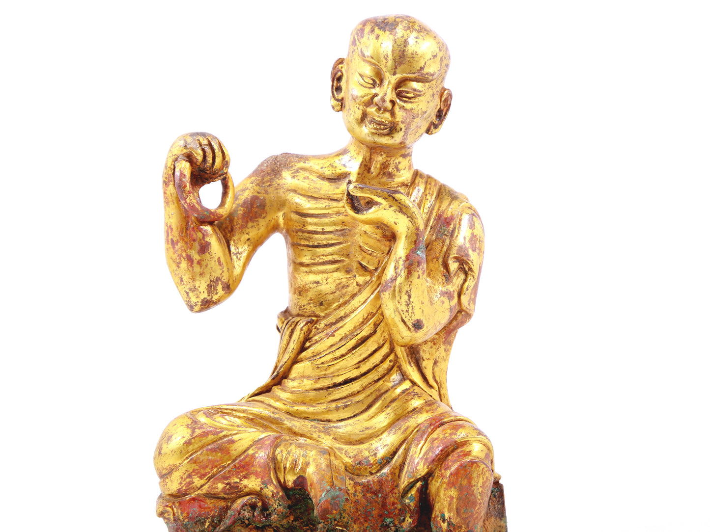 A serene gilt bronze Arhat statue