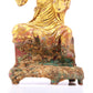 A serene gilt bronze Arhat statue