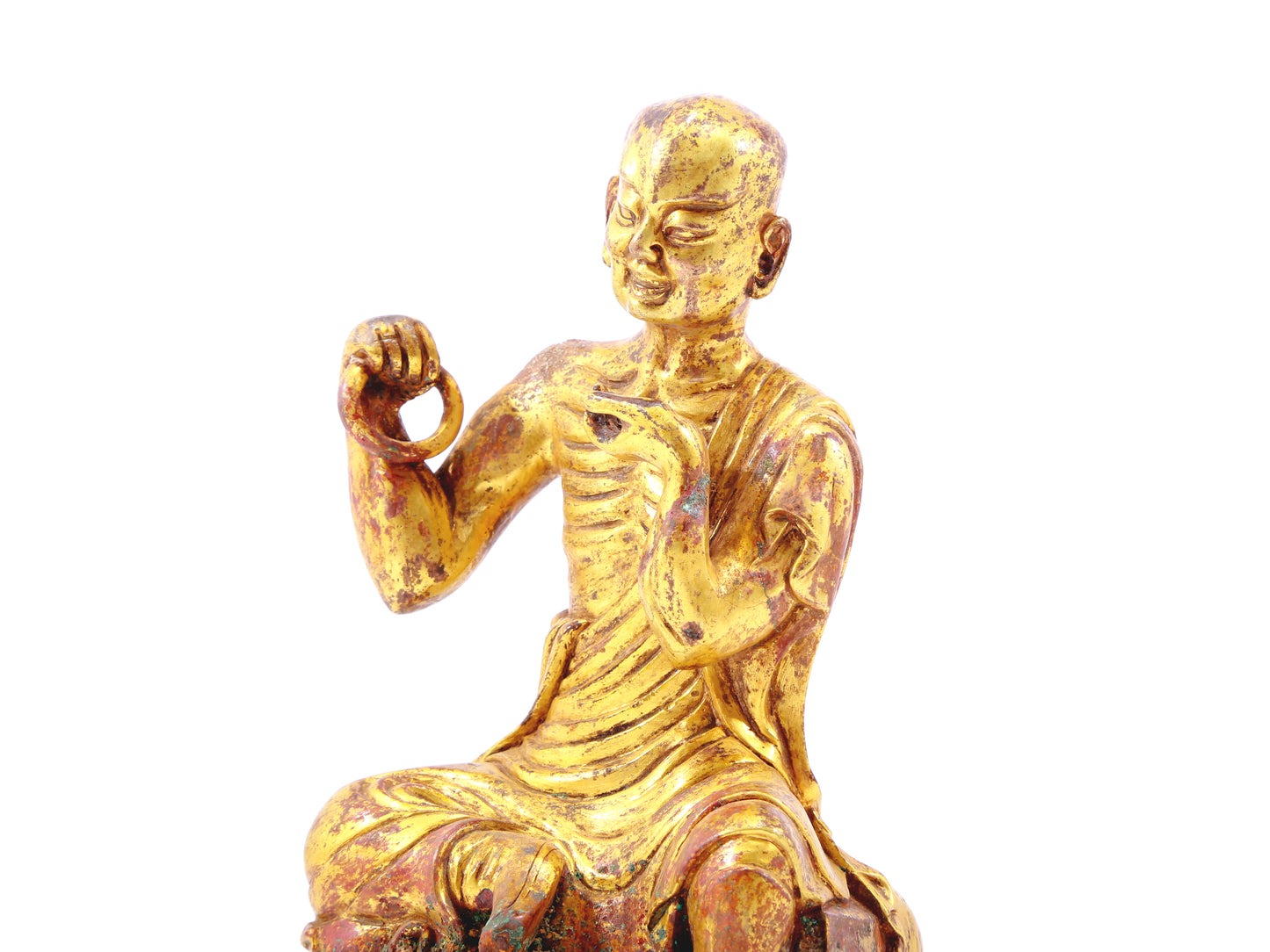 A serene gilt bronze Arhat statue