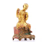 A serene gilt bronze Arhat statue