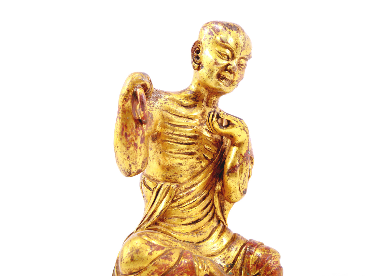 A serene gilt bronze Arhat statue