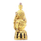 A serene gilt bronze statue of Gautama Buddha