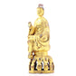 A serene gilt bronze statue of Gautama Buddha