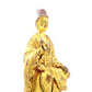 A serene gilt bronze statue of Gautama Buddha