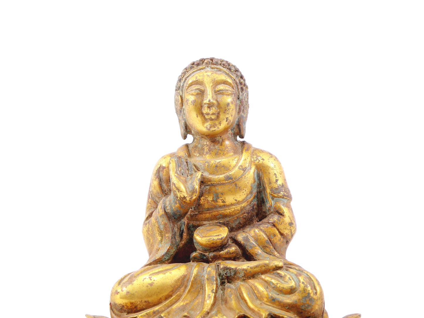 A serene gilt bronze statue of Gautama Buddha