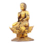 A serene gilt bronze statue of Gautama Buddha