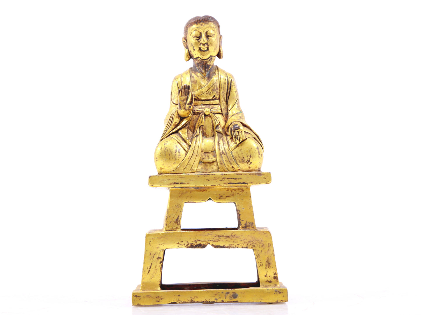 A serene gilt bronze figure