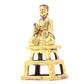 A serene gilt bronze figure