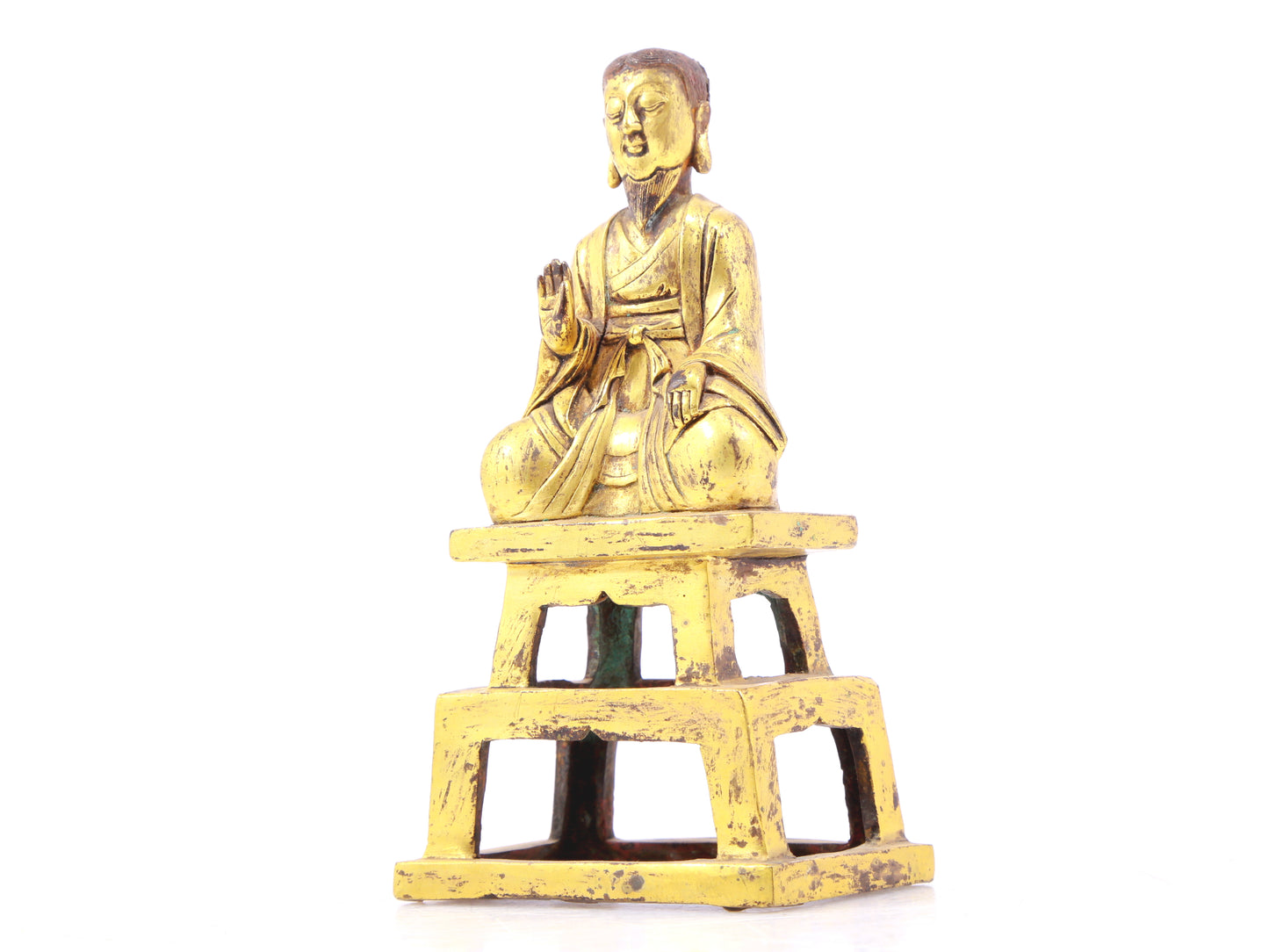 A serene gilt bronze figure