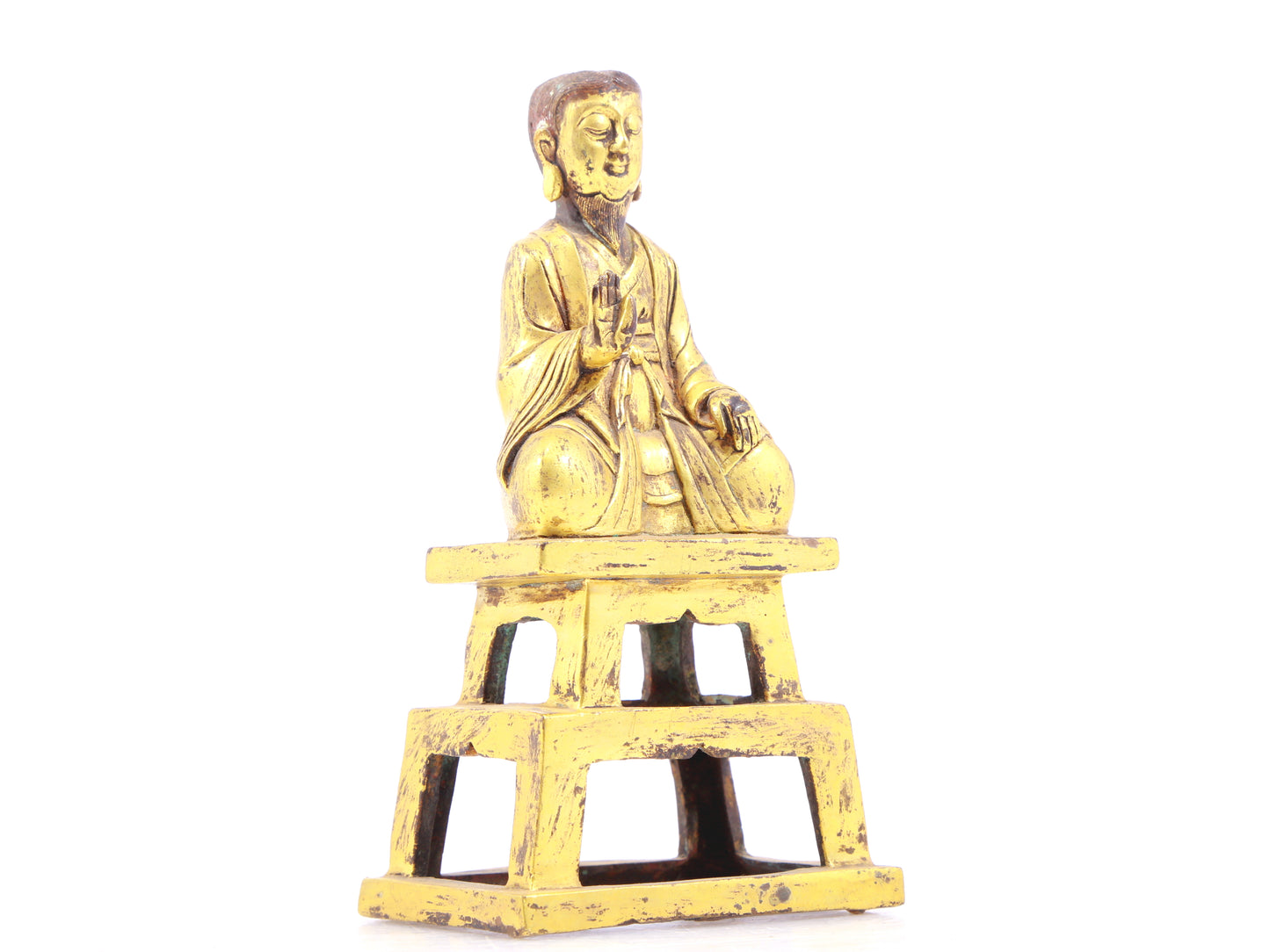 A serene gilt bronze figure