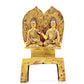 A serene gilt bronze statue of Gautama Buddha