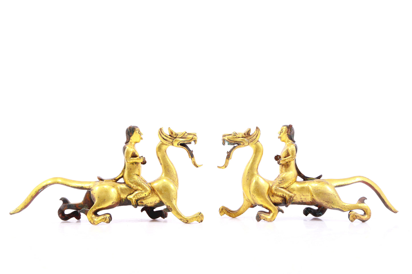 A pair of gilt bronze auspicious animal ornaments