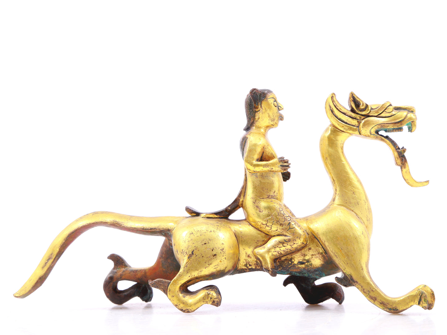 A pair of gilt bronze auspicious animal ornaments