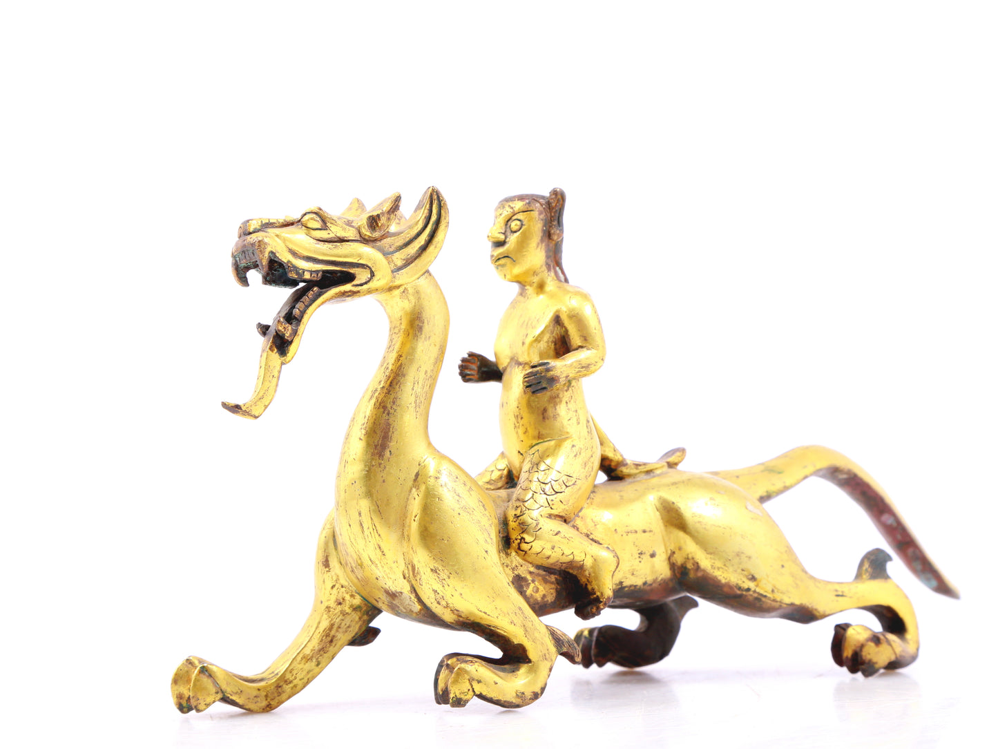 A pair of gilt bronze auspicious animal ornaments