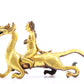 A pair of gilt bronze auspicious animal ornaments