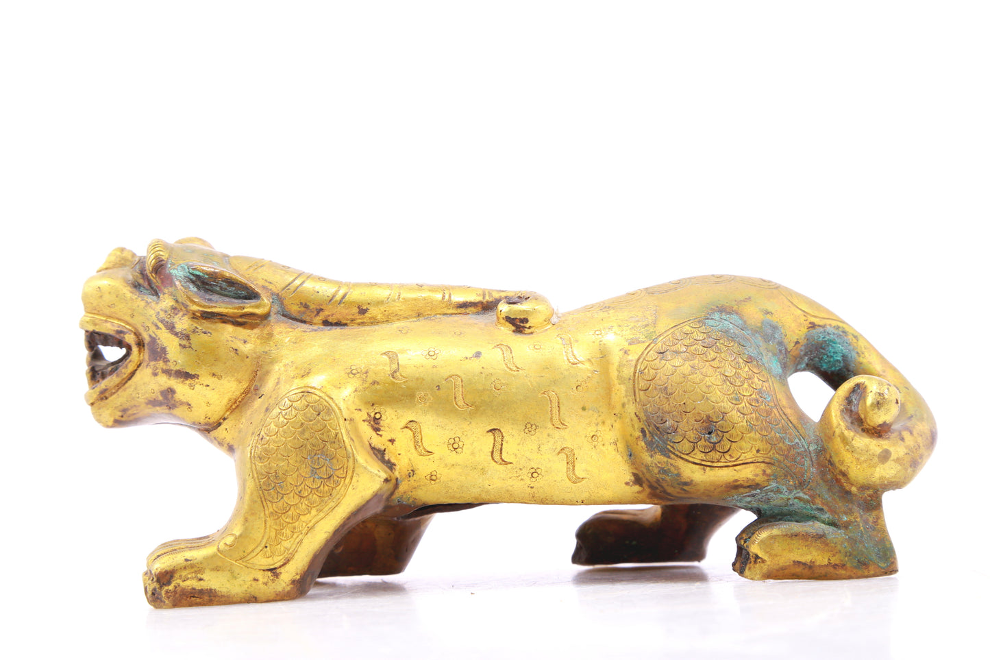 An exquisite gilt bronze animal ornament