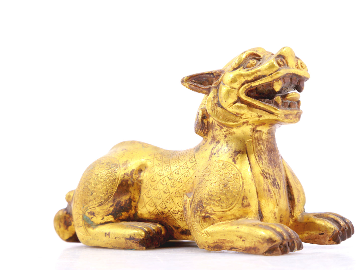 An exquisite gilt bronze animal ornament