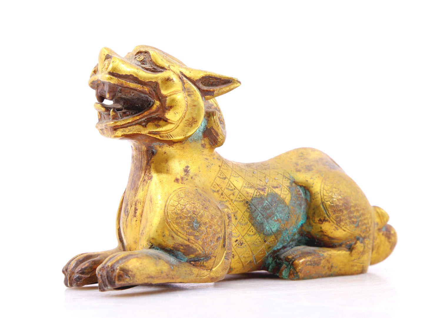 An exquisite gilt bronze animal ornament