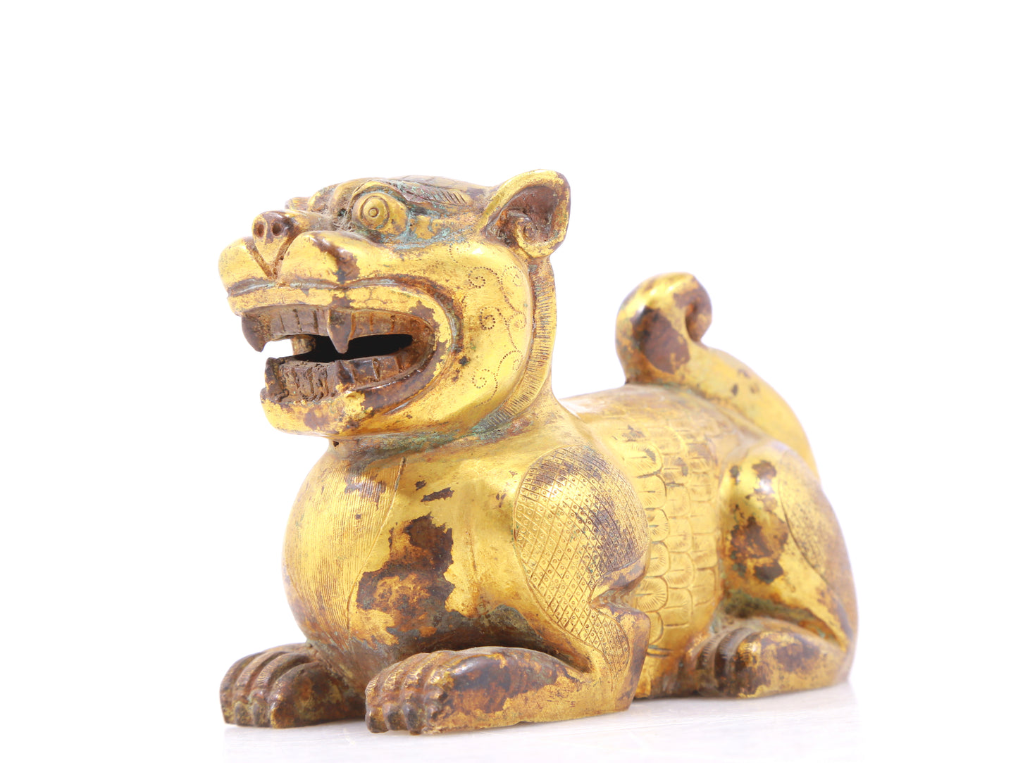 An exquisite gilt bronze animal ornament