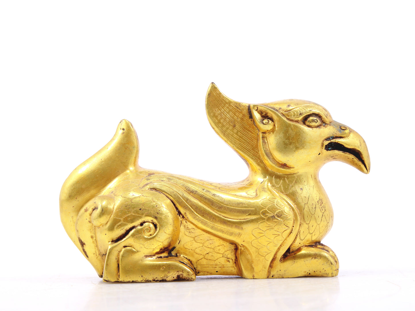 An exquisite gilt bronze animal ornament