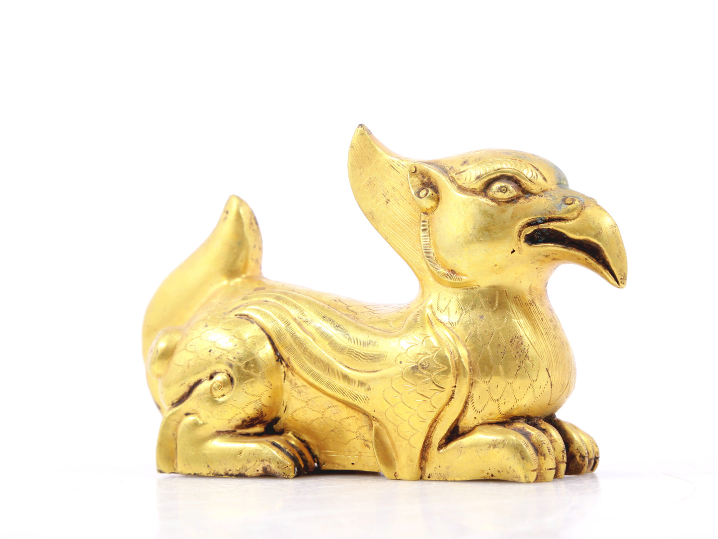 An exquisite gilt bronze animal ornament