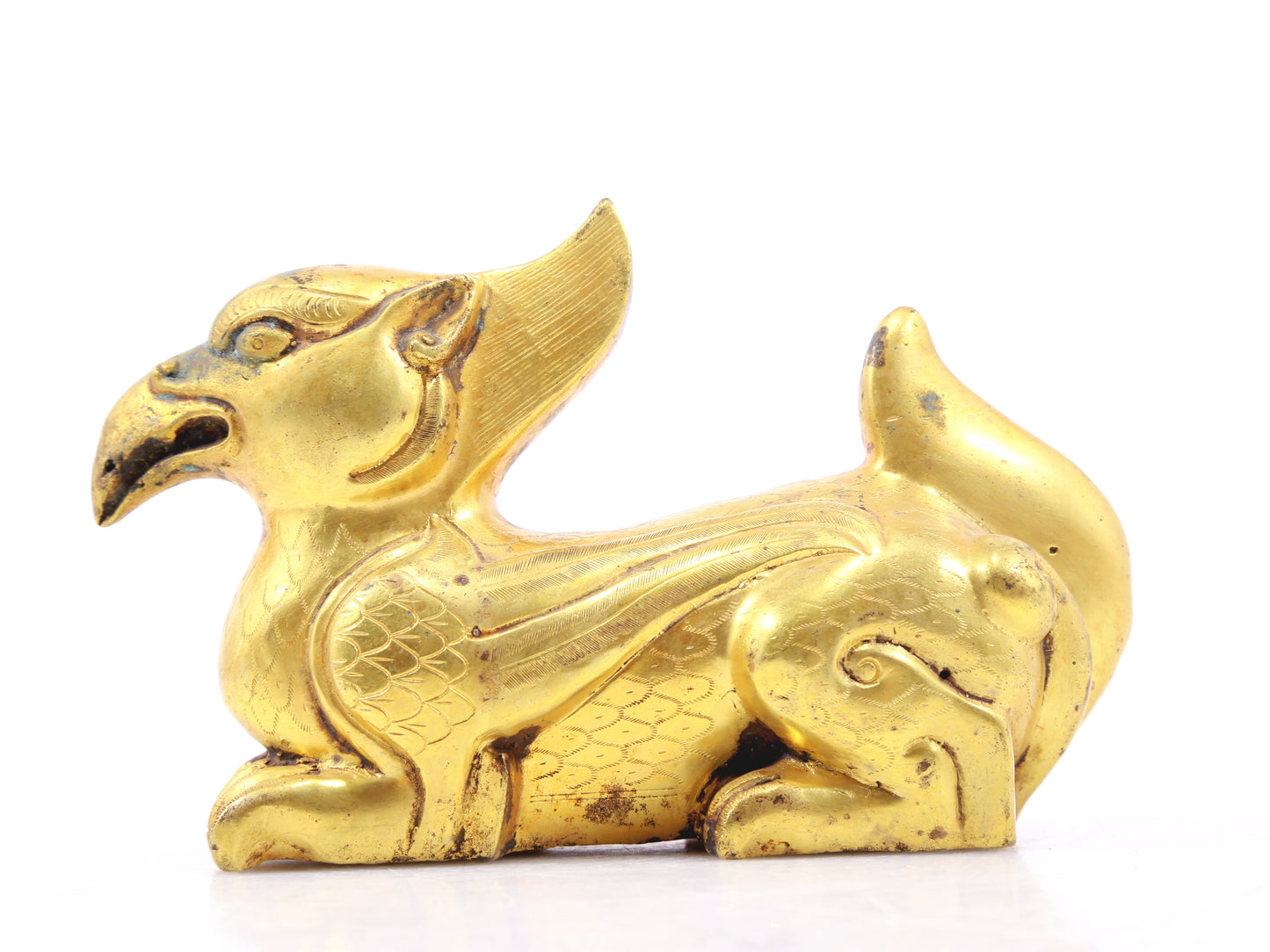 An exquisite gilt bronze animal ornament