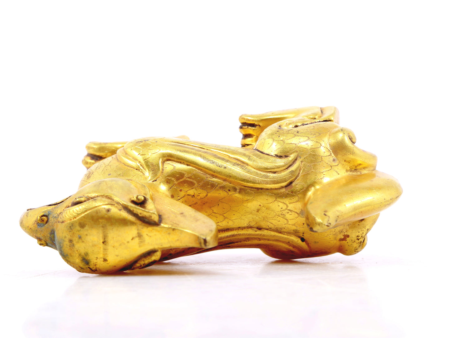 An exquisite gilt bronze animal ornament