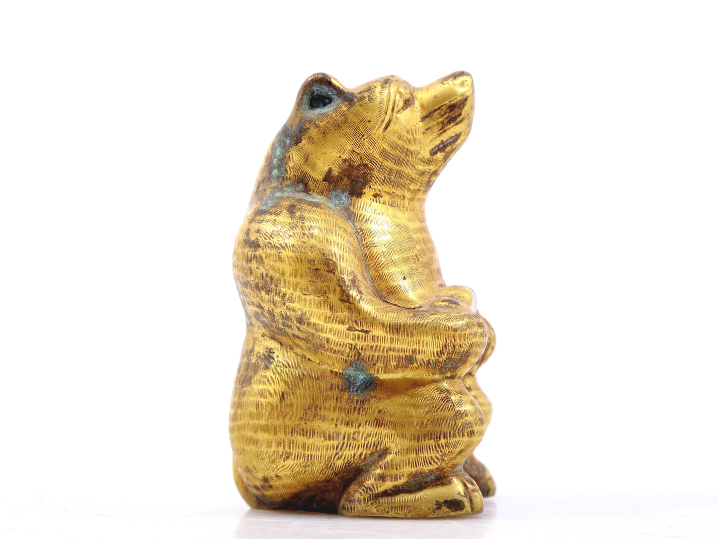 An exquisite gilt bronze bear ornament