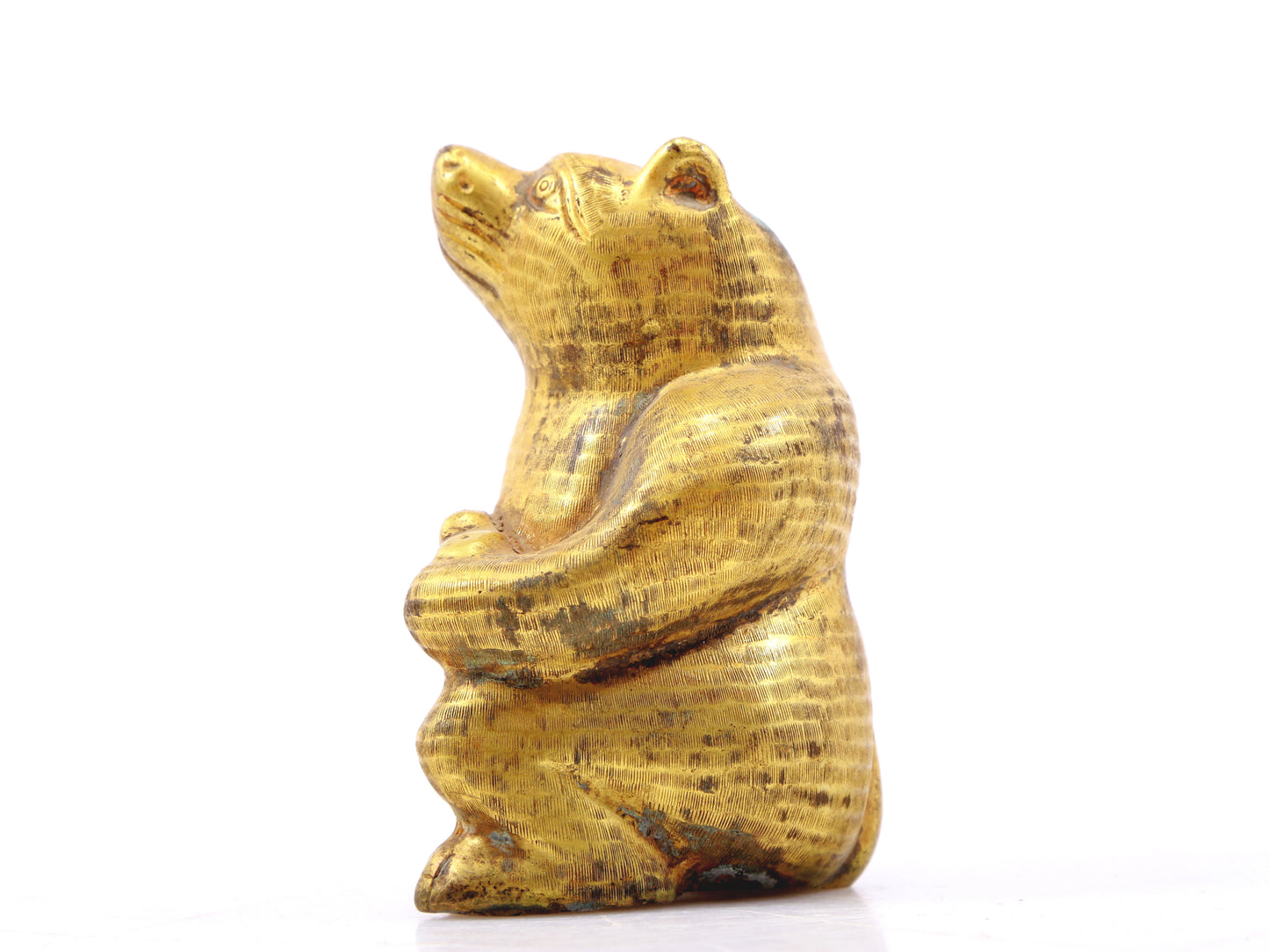 An exquisite gilt bronze bear ornament