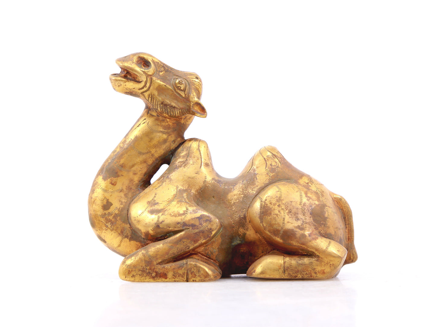 An exquisite gilt bronze camel ornament