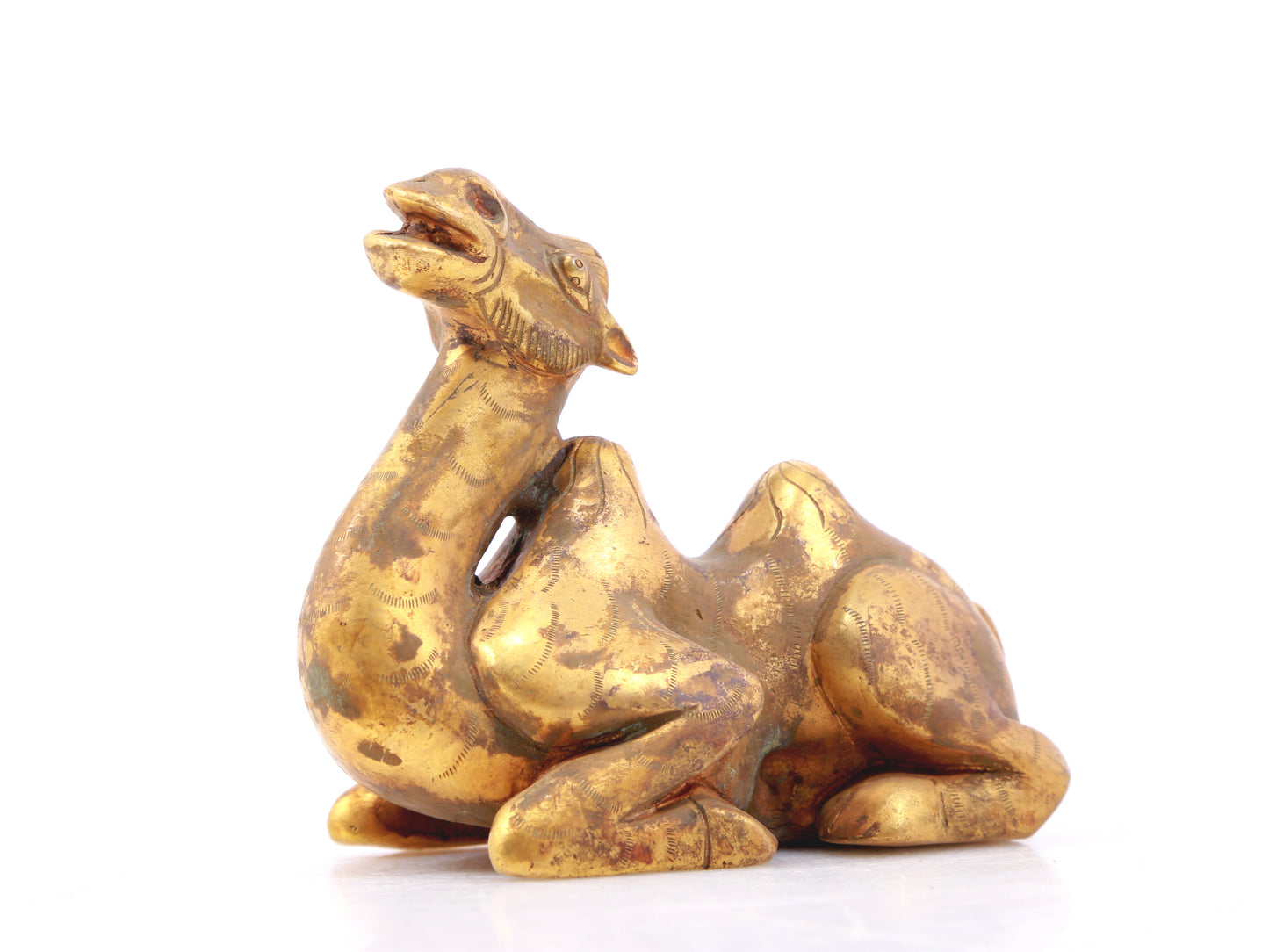 An exquisite gilt bronze camel ornament