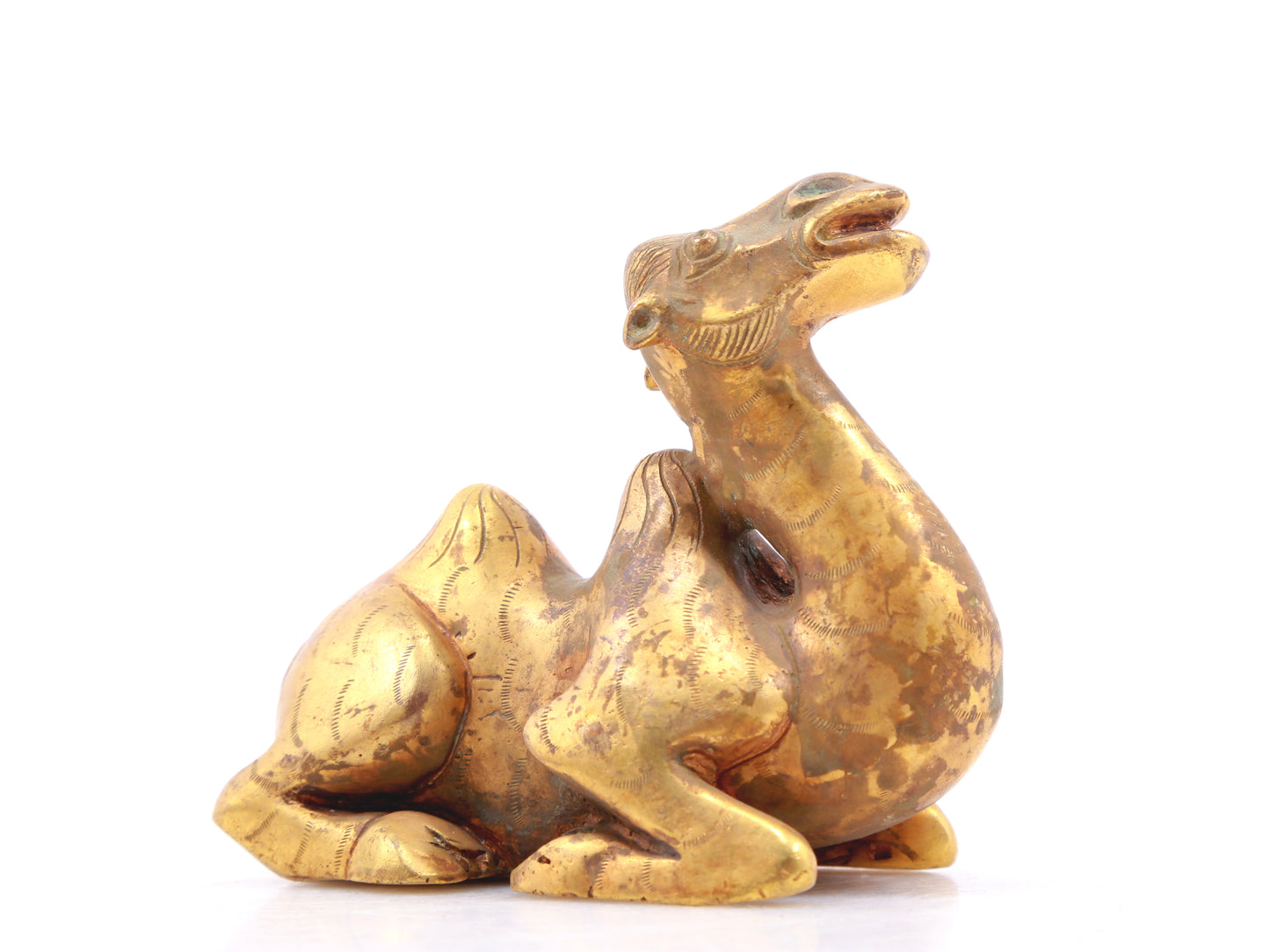 An exquisite gilt bronze camel ornament