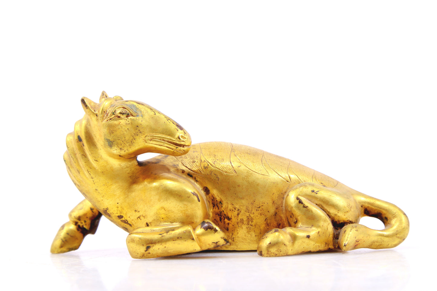 An exquisite gilt bronze animal ornament