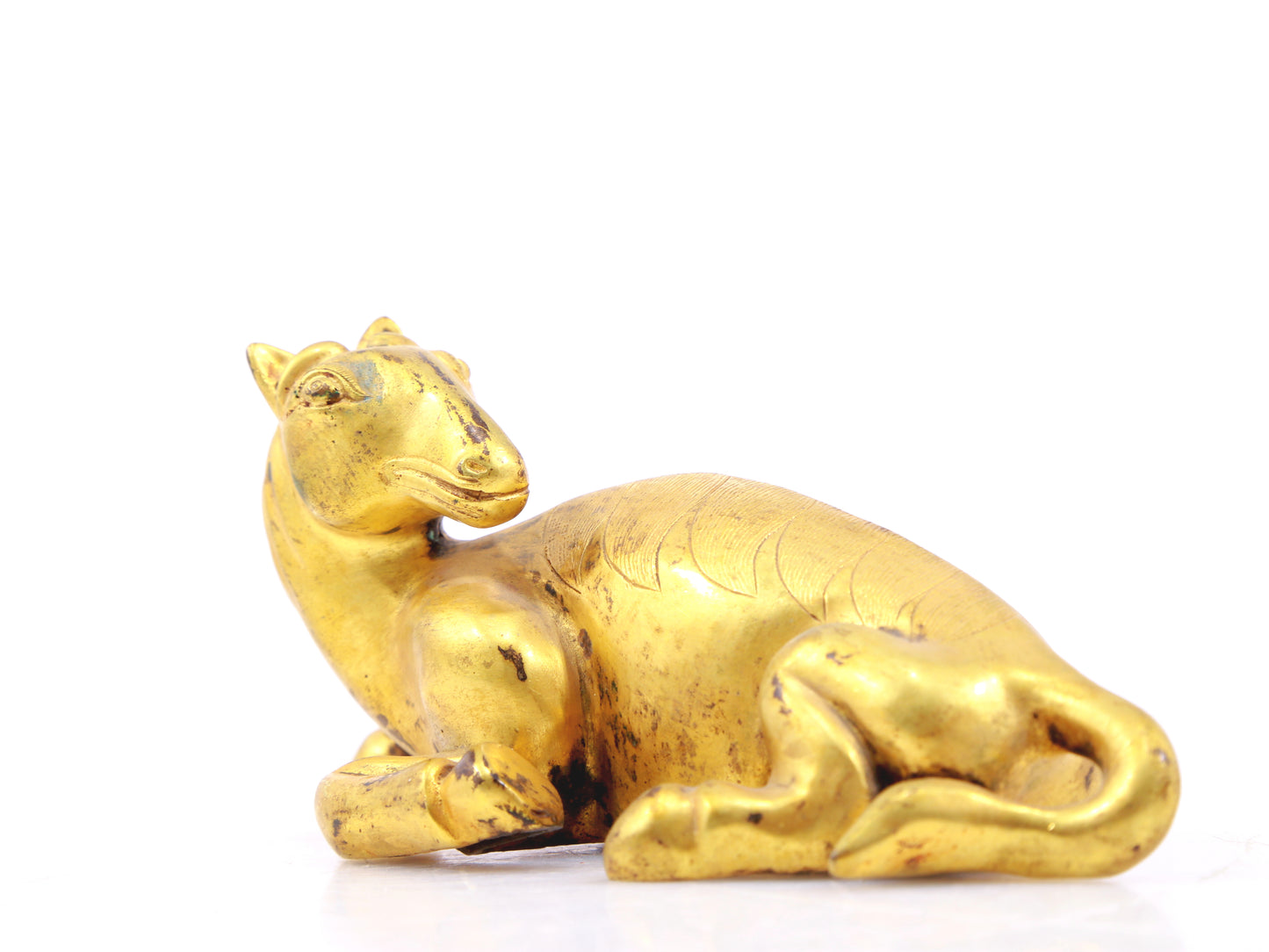 An exquisite gilt bronze animal ornament