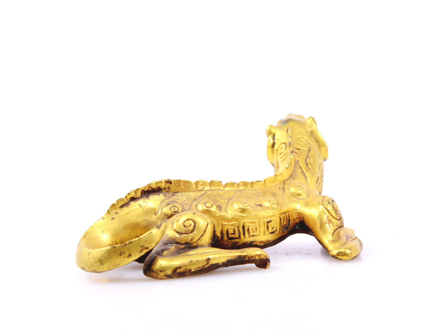 An exquisite gilt bronze animal ornament