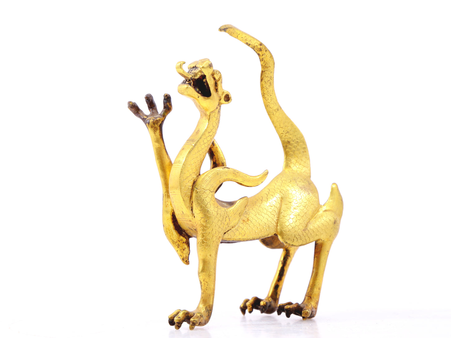 An exquisite gilt bronze animal ornament