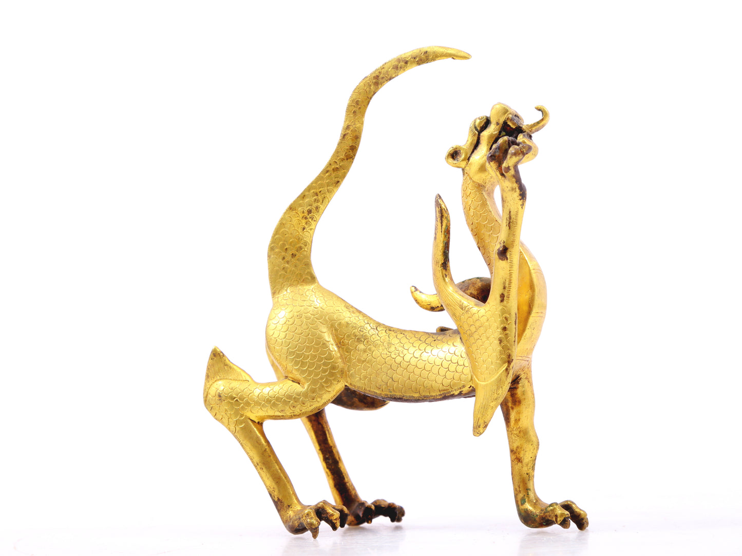 An exquisite gilt bronze animal ornament