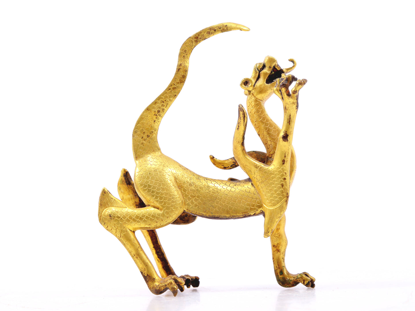 An exquisite gilt bronze animal ornament