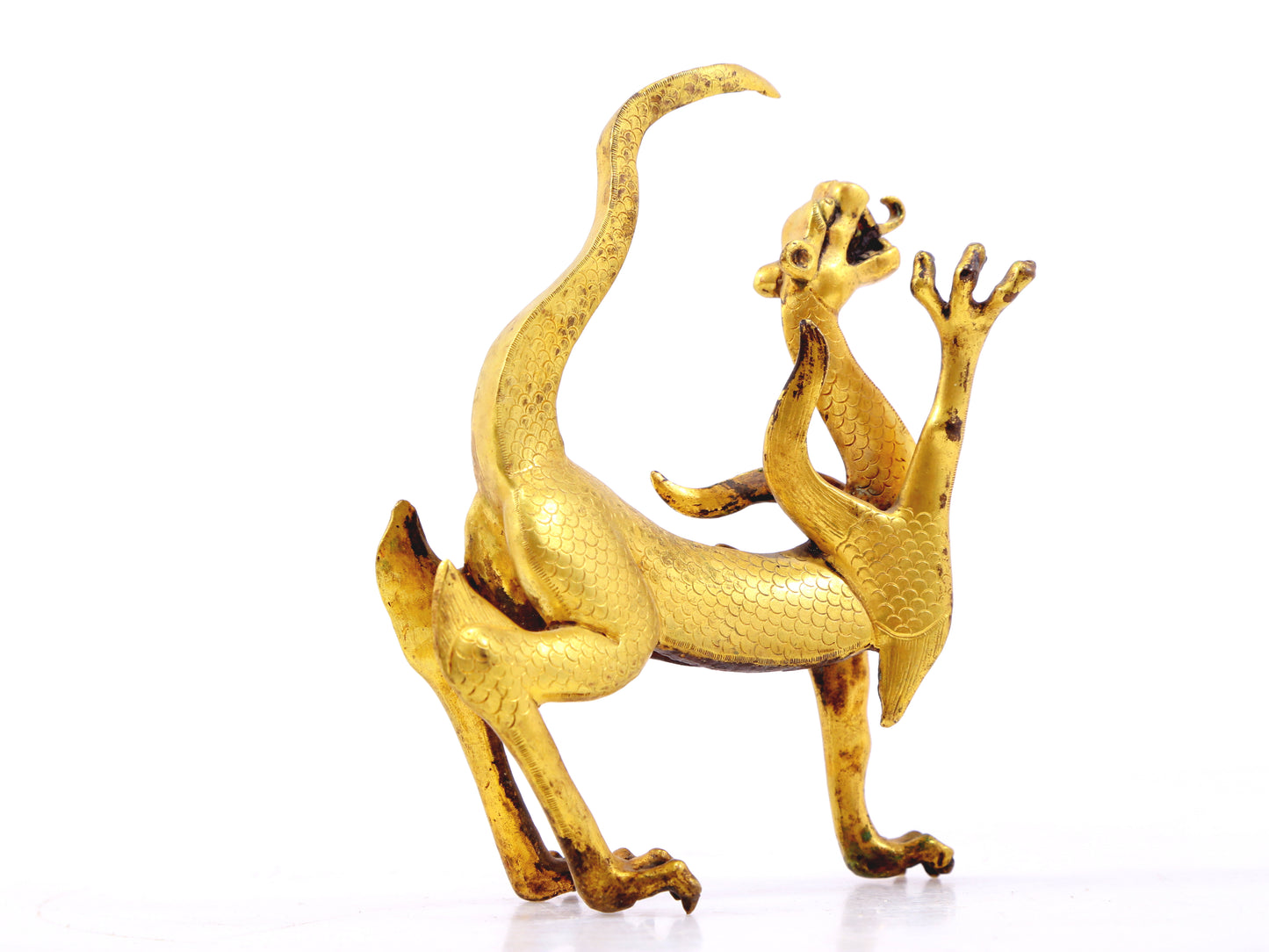 An exquisite gilt bronze animal ornament