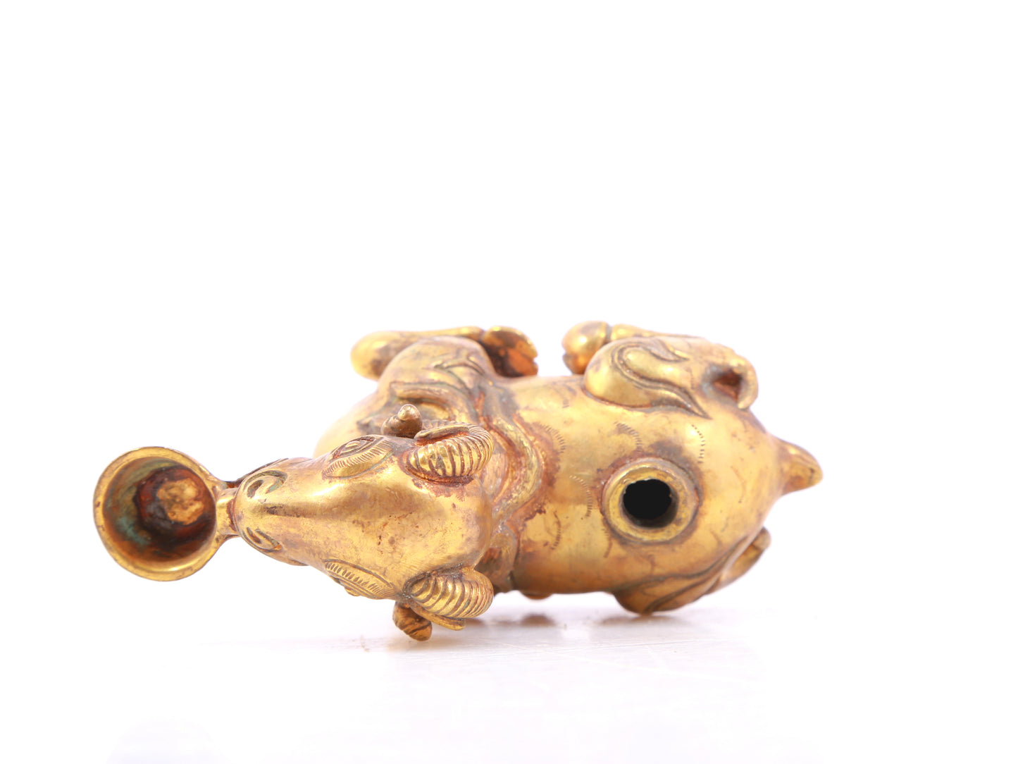 An exquisite gilt bronze goat figurine