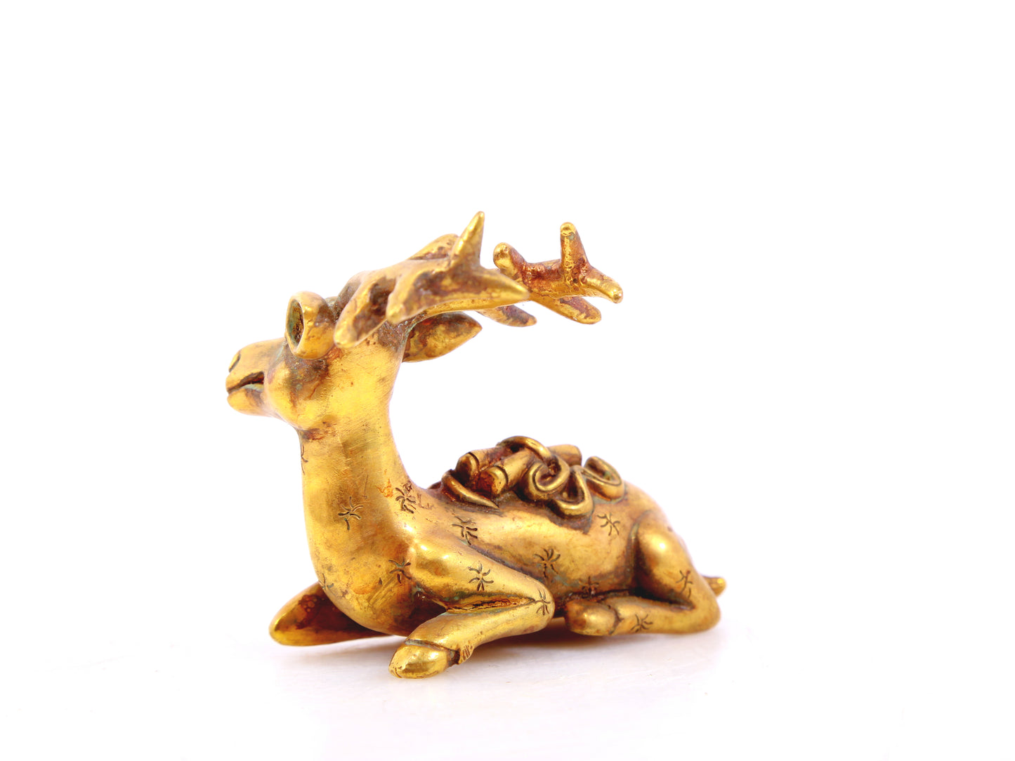 An exquisite gilt bronze deer ornament