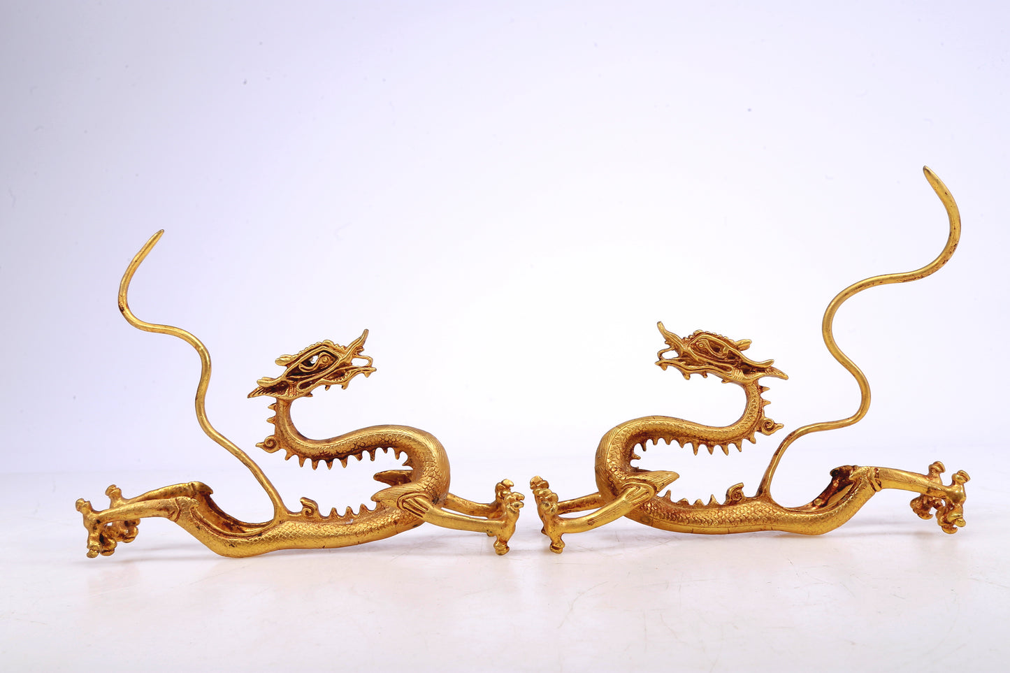 A Brilliant Pair Of Gilt-Bronze Dragons