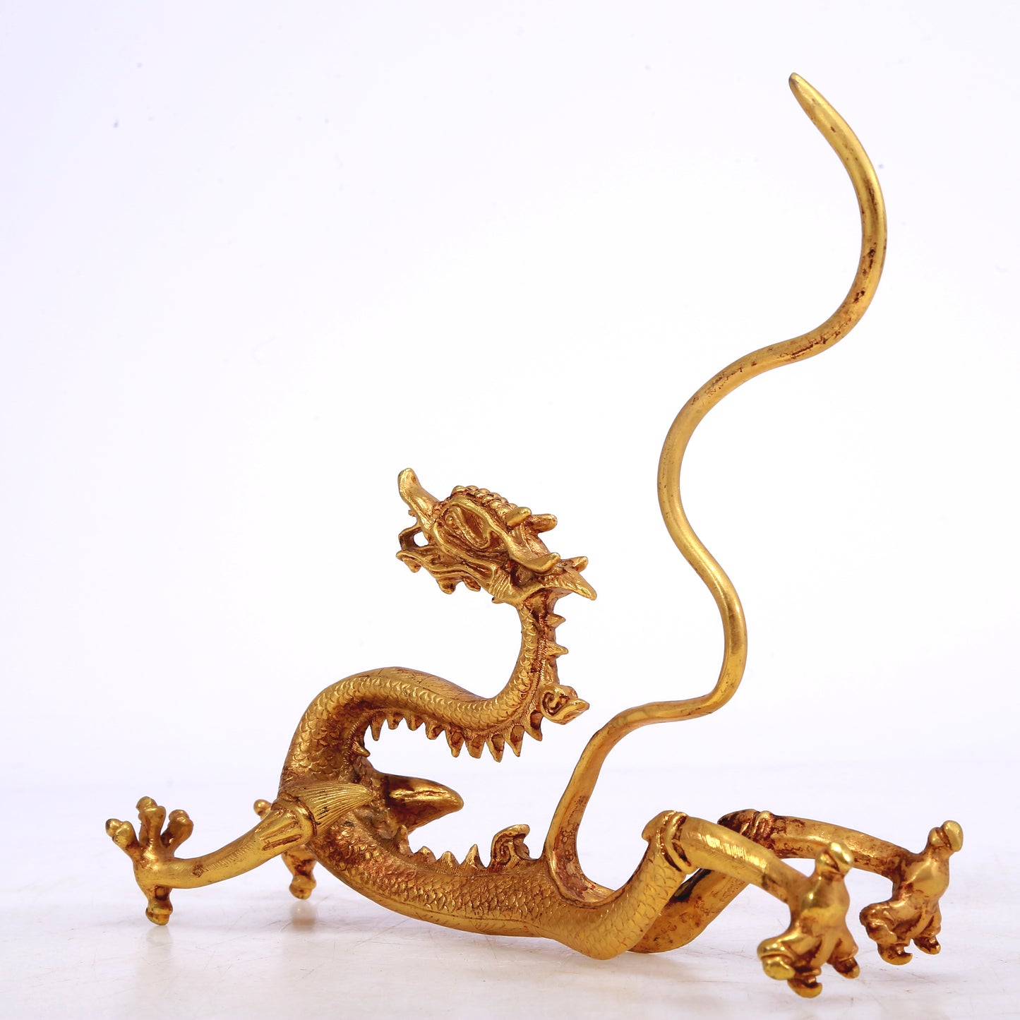 A Brilliant Pair Of Gilt-Bronze Dragons