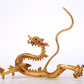 A Brilliant Pair Of Gilt-Bronze Dragons